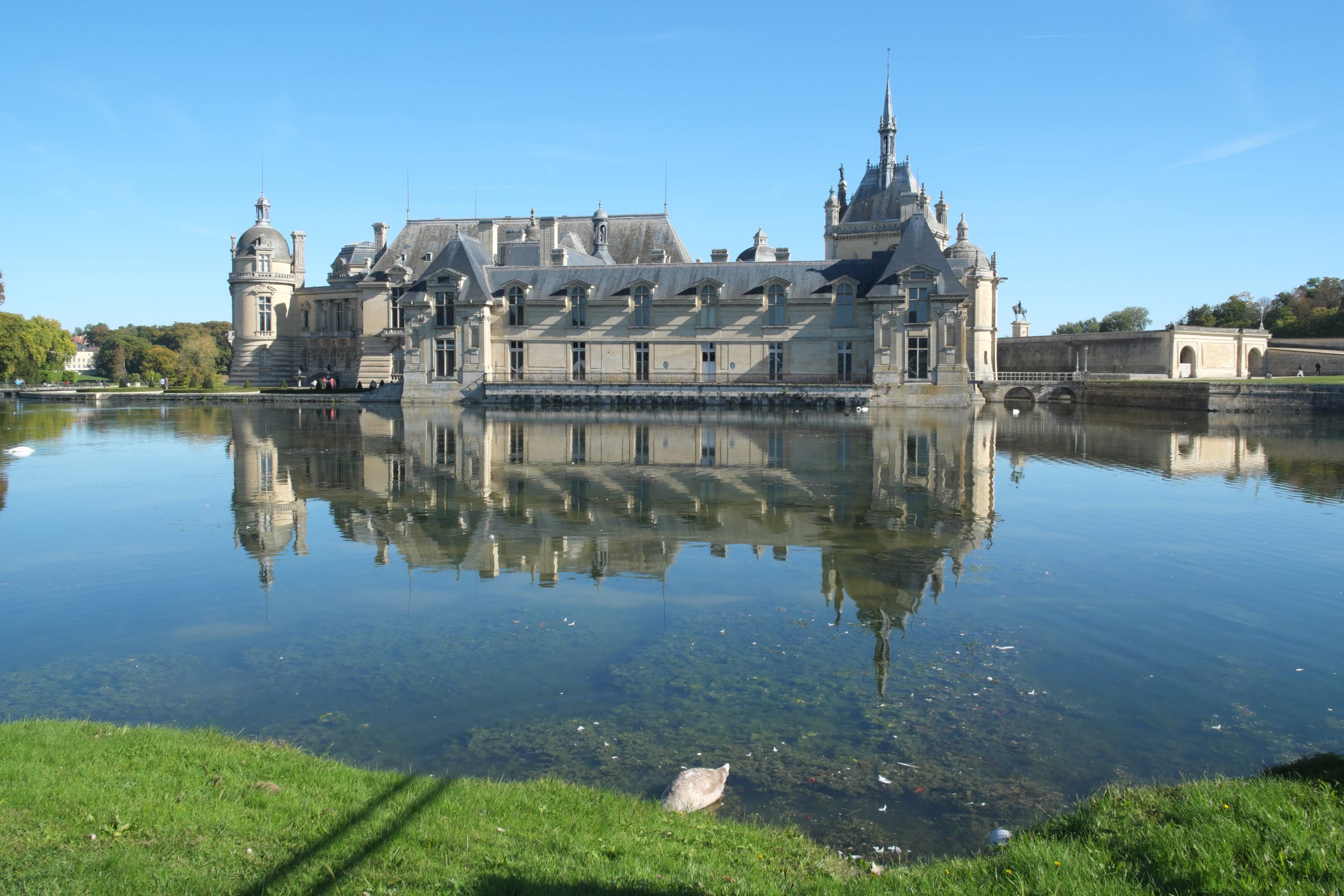 Château de Chantilly reflected in the moat